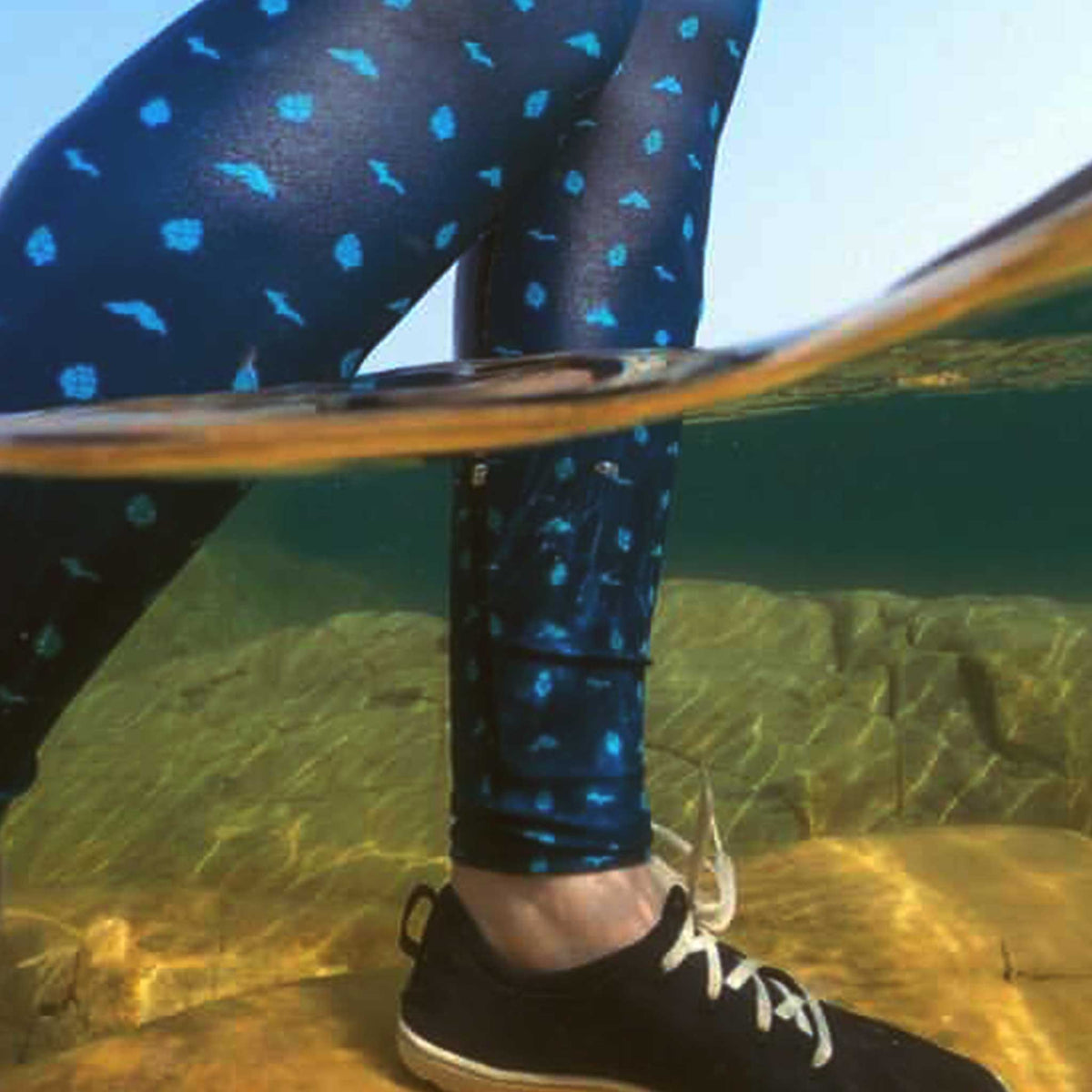 a person's legs in the water